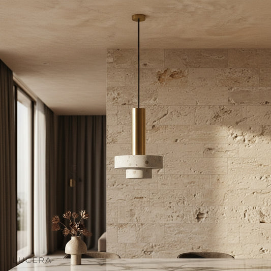 pink terrazzo pendant light illuminating modern living room with chrome rose gold accents