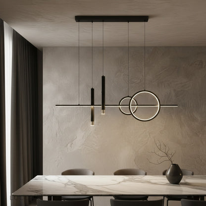 Trim Pendant Light by Lucera glowing above a modern dining table in warm ambient light