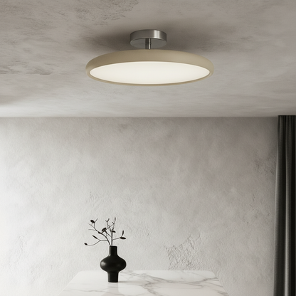 Jubilate ceiling light glowing in modern bedroom with glossy metal and acrylic finish