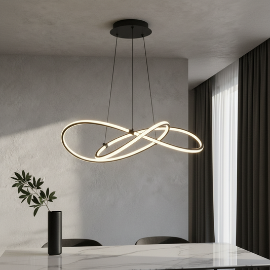 Fortuna Chandelier by Lucera glowing above modern dining table in warm ambient light