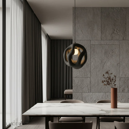 Entwine flame pendant light glowing over modern kitchen island in warm ambient setting