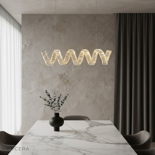 Davy's Grey Chandelier glowing in modern living room with gold spiral frame and crystals
