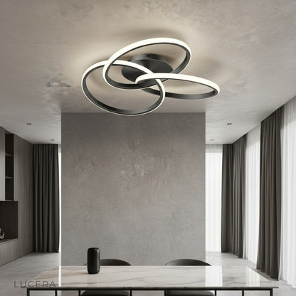 Loom ceiling light illuminating modern bedroom with warm ambient glow