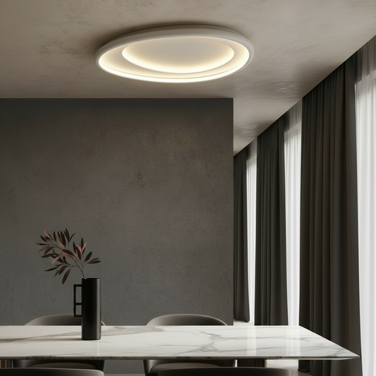 Tantalus ceiling light glowing in modern living room with white chrome finish