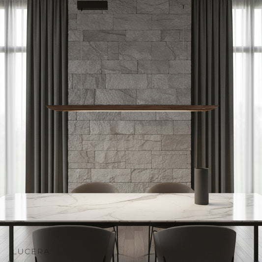 Fauvist pendant light glowing over a modern dining table in a minimalist Scandinavian living room