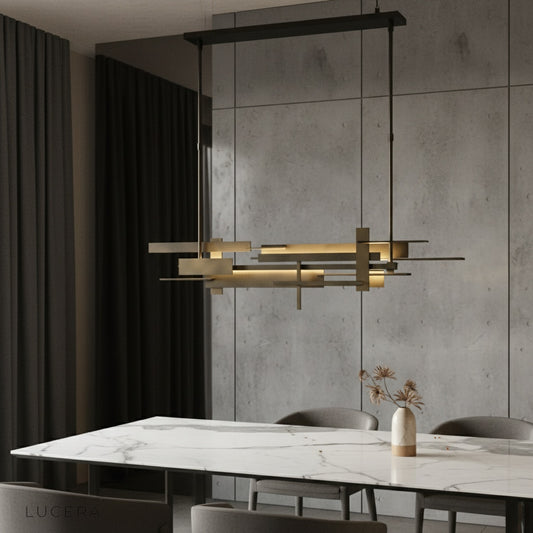Cassiopeia chandelier glowing above modern dining table in contemporary living room