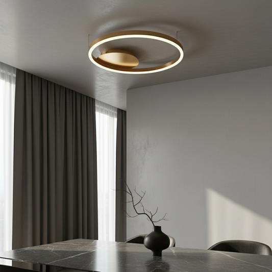 modern Caterina ceiling light glowing in contemporary living room with three interlocking circular frames