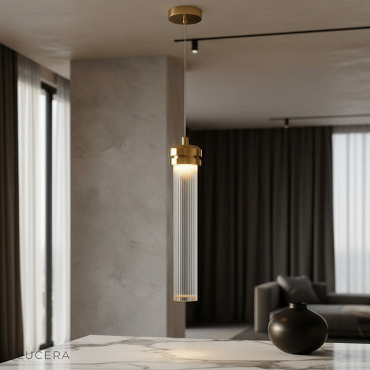 Palace Pendant Light glowing above a dining table in a modern living room with gold accents