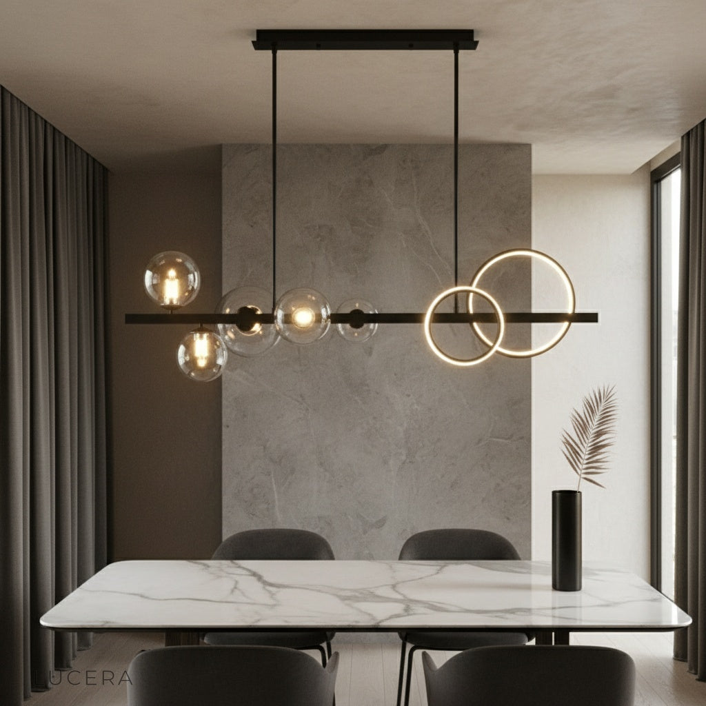Mare pendant light glowing above modern dining table in contemporary living room