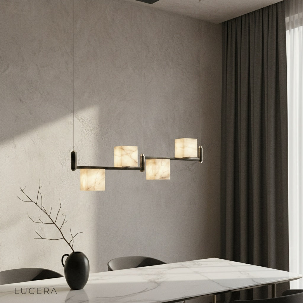 Lodge Alabaster Chandelier linear black frame glowing over modern dining table