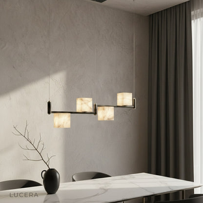 Lodge Alabaster Chandelier linear black frame glowing over modern dining table