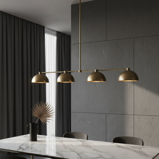 Ursule Linear Brass Dome Pendant Light above modern kitchen island with warm ambient glow