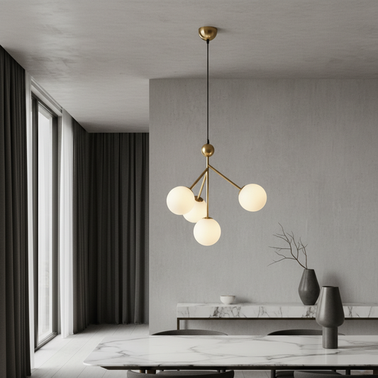 Xaverian pendant light with four milk-white glass globes over a modern dining table