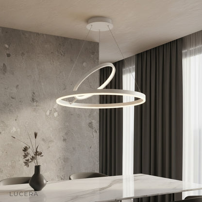 Opaque Chandelier ring pendant illuminating a modern living room with warm ambient light