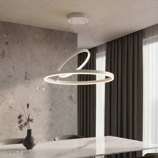 Opaque Chandelier ring pendant illuminating a modern living room with warm ambient light