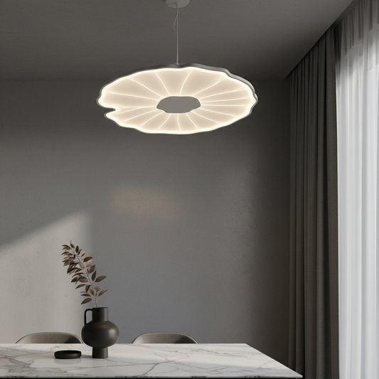 Niveous ceiling light with petal layers illuminating a modern living room