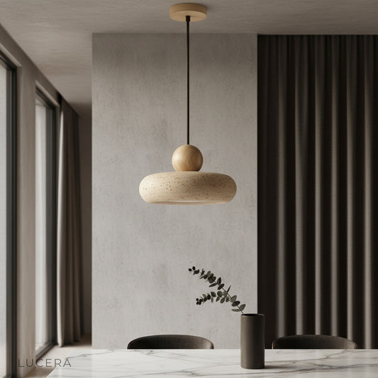 Mensa Pendant Light over dining table with travertine and wood accents