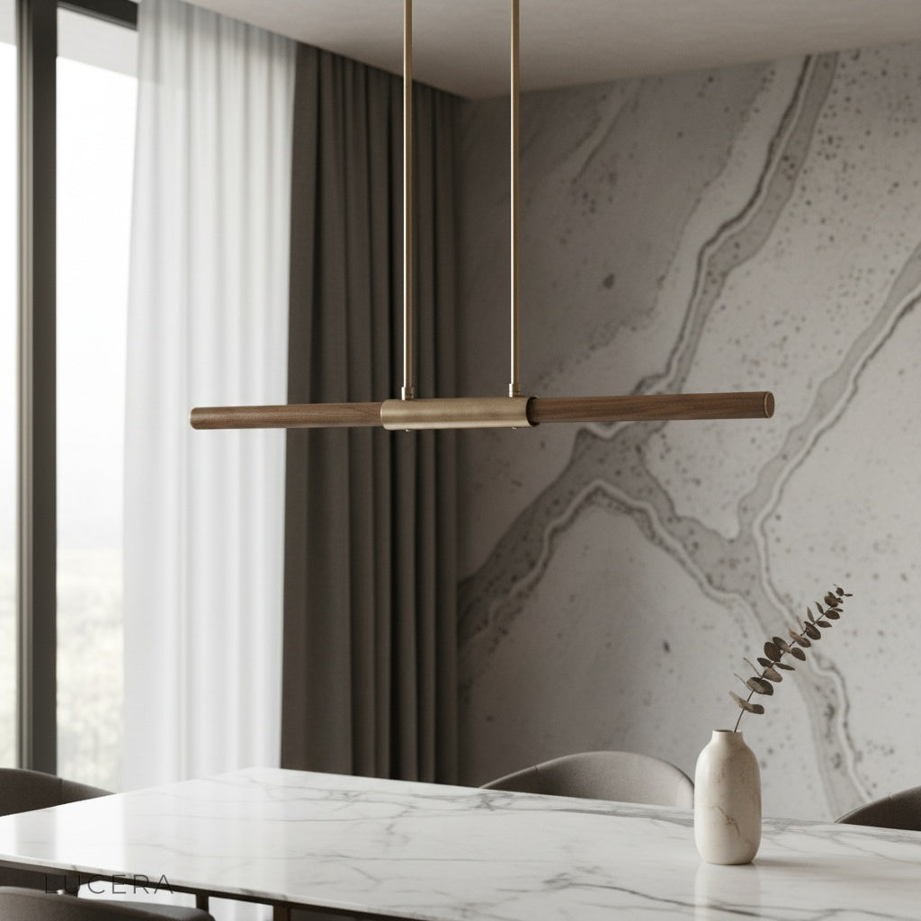 Griselda pendant light with copper and wood shades illuminating a modern dining room