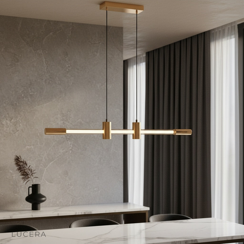 Gideon pendant light glowing warmly above a modern dining table in a stylish living room