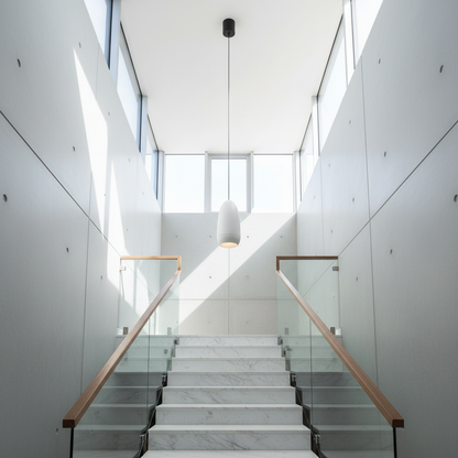 modern capsule pendant lights cascading over a contemporary stairwell