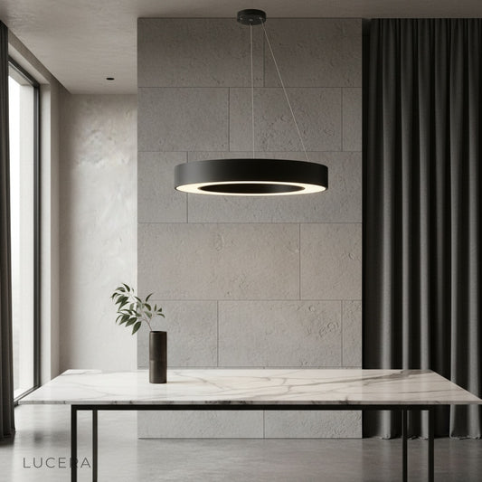 modern ring chandelier glowing above dining table in contemporary living room
