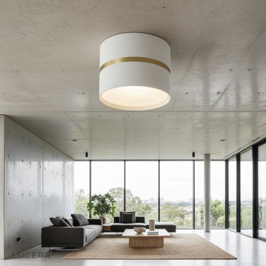 Chamani downlight in black finish illuminating a modern hallway with warm ambient light