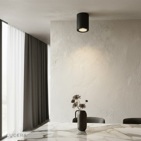 modern rafter downlight casting warm glow in contemporary living room