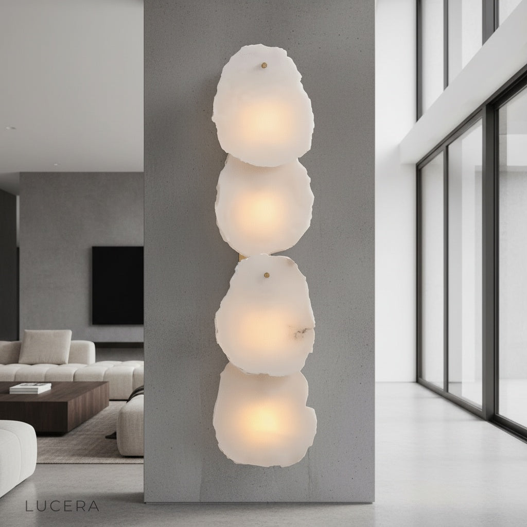 Esker wall lamp with alabaster marble and copper glowing in a modern living room