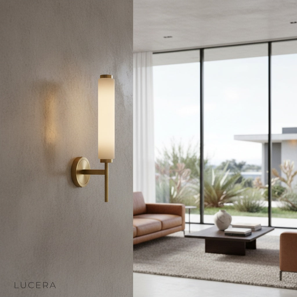 Boreas wall lamp glowing warmly in a modern bedroom with alabaster shade and copper frame