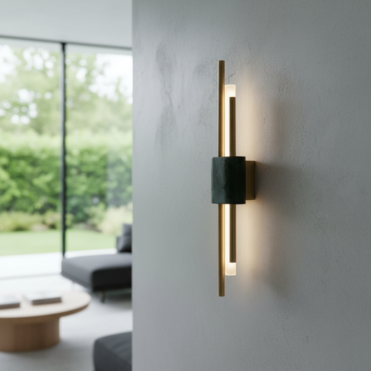 Xyloid wall lamp glowing warm in modern living room with marble and acrylic accents