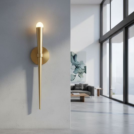modern gold wall lamp with crystal top illuminating a hallway