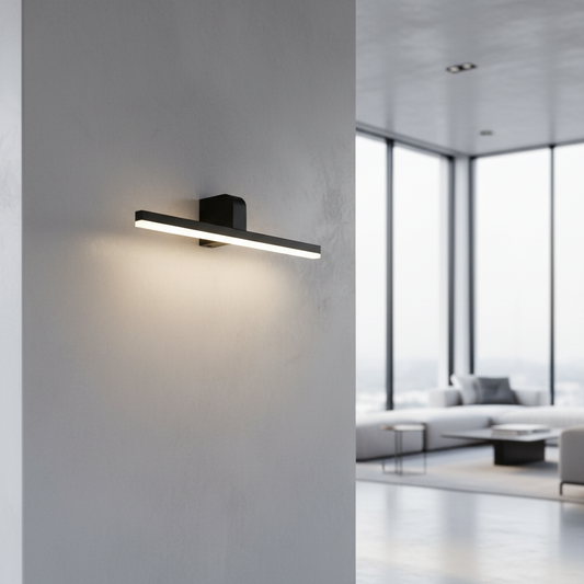 modern knob wall lamp illuminating bathroom vanity mirror in sleek interior