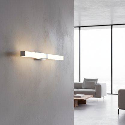 modern stainless steel wall lamp glowing above bathroom vanity mirror