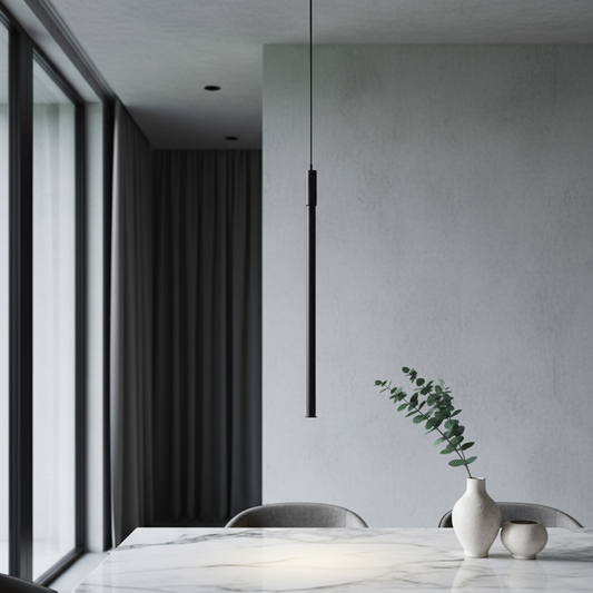 modern linear LED pendant light glowing above a minimalist living room sofa