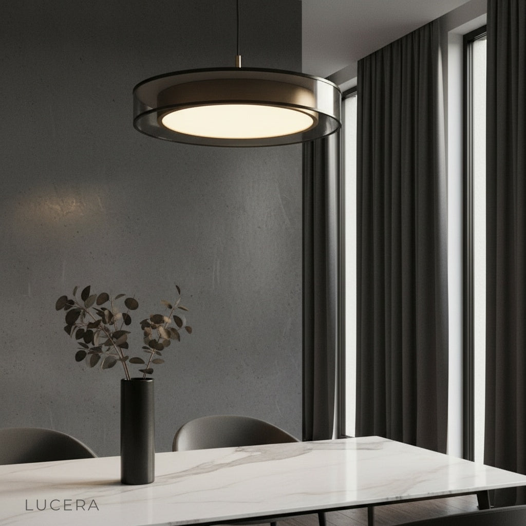 Alaric ceiling light with layered glass rings glowing in a modern living room
