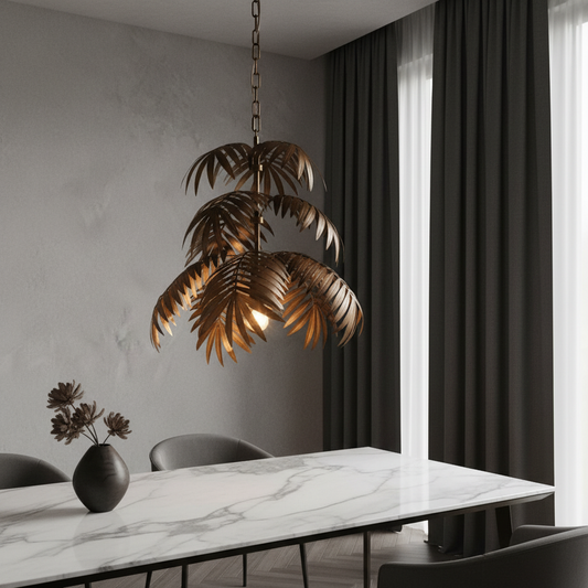 Zibibbo chandelier with tropical leaf design illuminating a modern coastal living room
