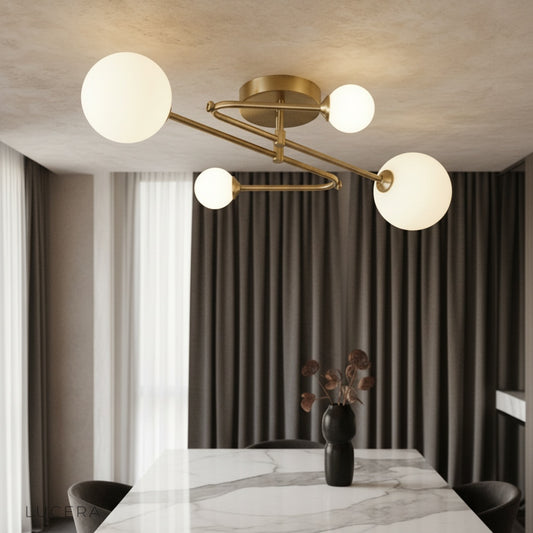 Fringe ceiling light with copper arms and frosted glass spheres in modern living room