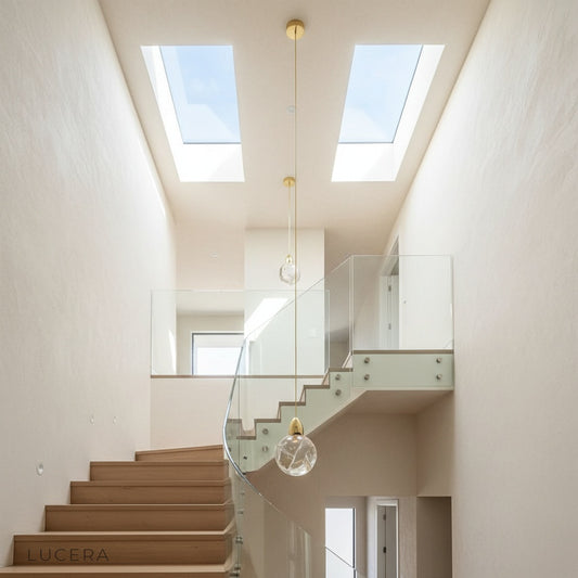 modern Dawn pendant light with crystal droplets illuminating a high-ceiling living room