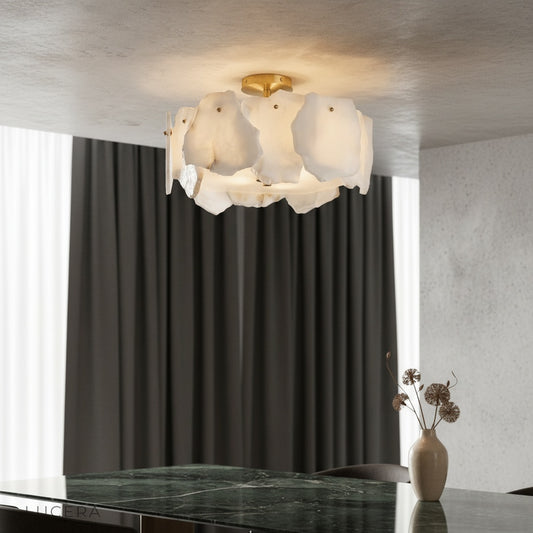 Fulgurant ceiling light with copper base and alabaster panels glowing in modern living room