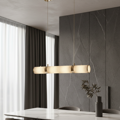 Vanguard Alabaster Chandelier illuminating modern kitchen island with warm ambient light