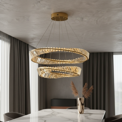 Umbilicus 2-tier crystal chandelier illuminating an elegant living room with warm ambient light
