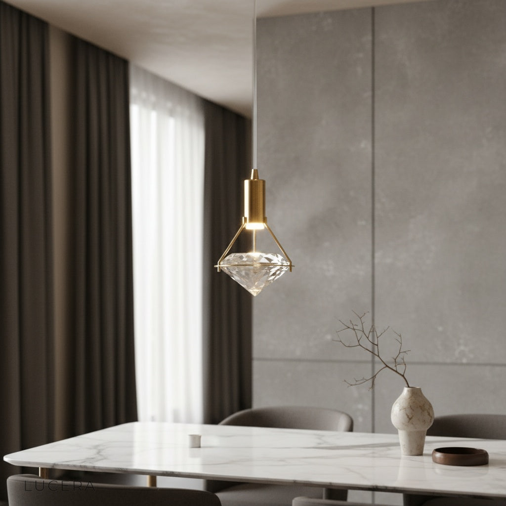 Silas pendant light gold finish illuminating modern living room with crystal accent