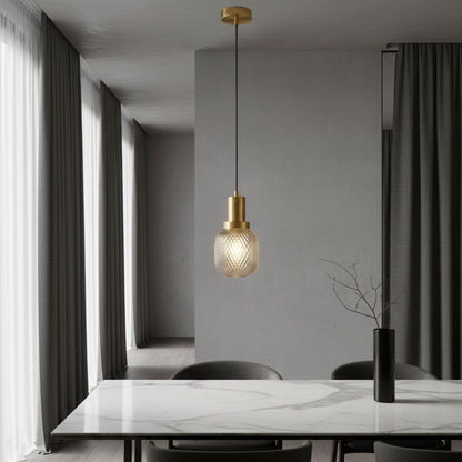 Silvia pendant light glowing over modern dining table in stylish living room