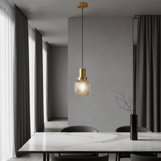 Silvia pendant light glowing over modern dining table in stylish living room