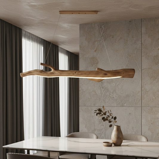 Humoresque pendant light with resin branches glowing warmly above a modern dining table in a spacious room