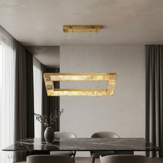 Port Chandelier gold finish in elegant living room with crystal frames