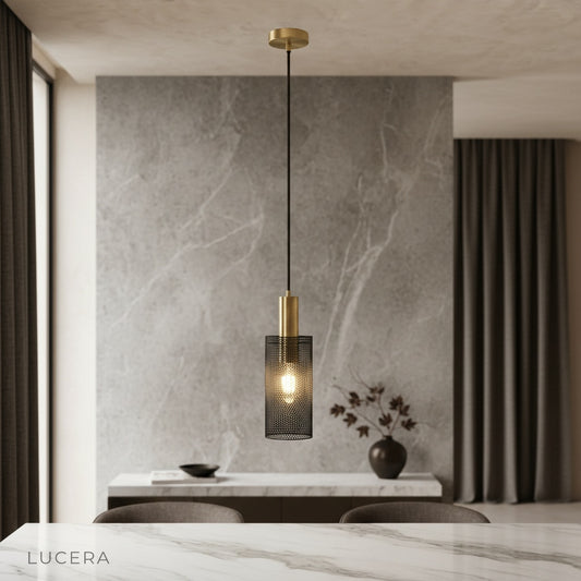 Wachau pendant light hanging over modern dining table in warm inviting room