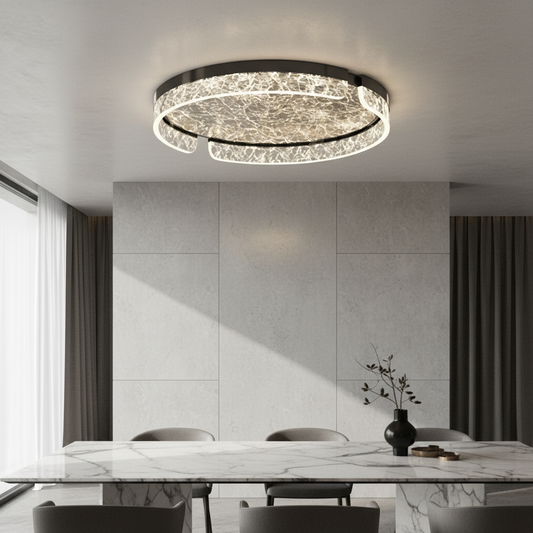 modern black and gold circular ceiling light illuminating a contemporary living room