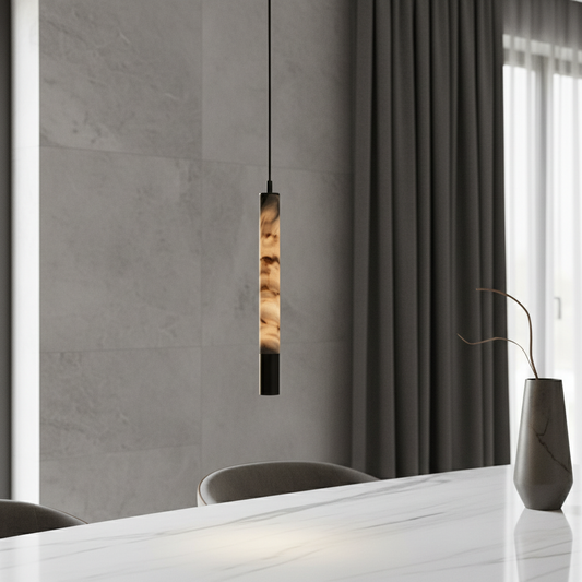 Yseult alabaster pendant light glowing over a modern dining table in a serene neutral-toned room