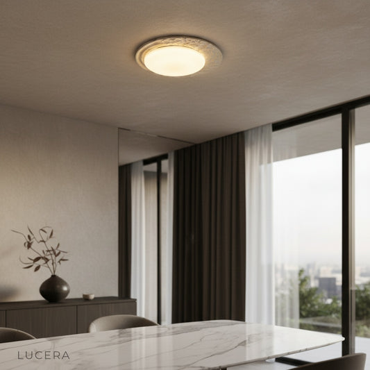 modern travertine and marble ceiling lamp glowing in contemporary living room